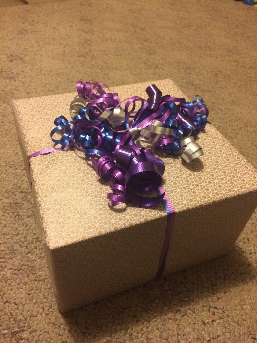 Wrapped gift with ribbon, representing a present for someone learning Spanish