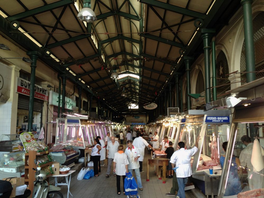 Covered stalls and shoppers at the Central Market of Athens, Greece