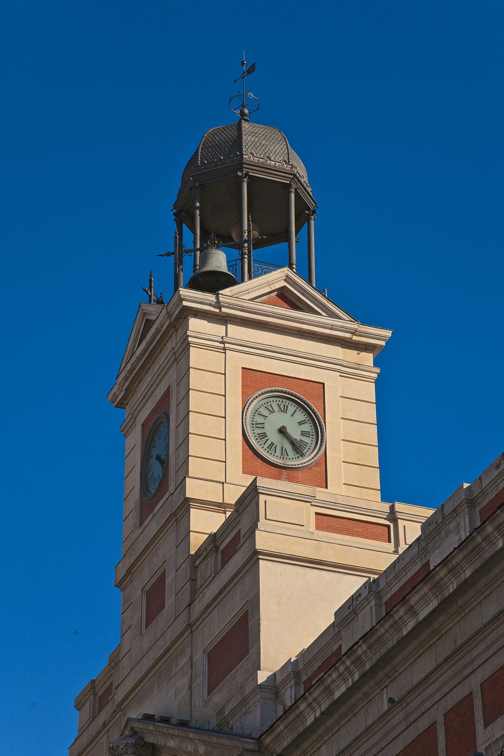 Historic clock above the Puerta del Sol square in Madrid, Spain, famous for marking the new year