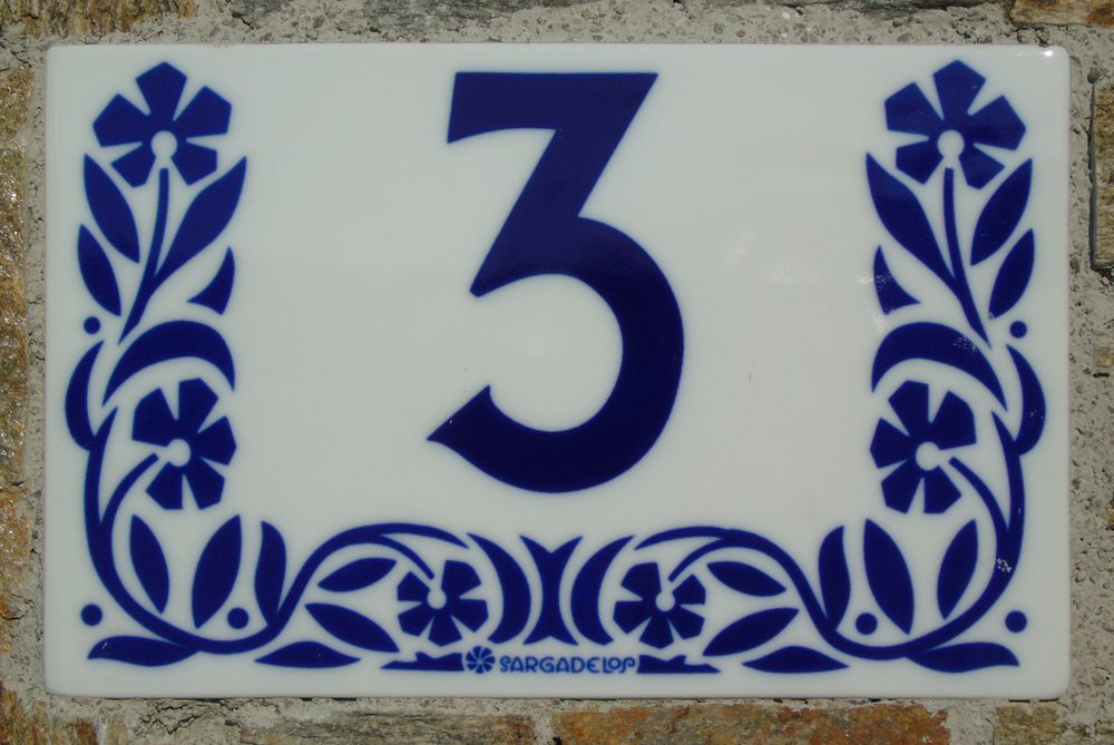 Ceramic house number plaque in Ribadeo, Spain